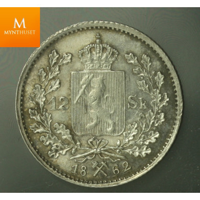 Sjelden! 12 skilling 1862 kvalitet 01, svært god histrikk på mynten solgt på Oslo Myntgalleri
